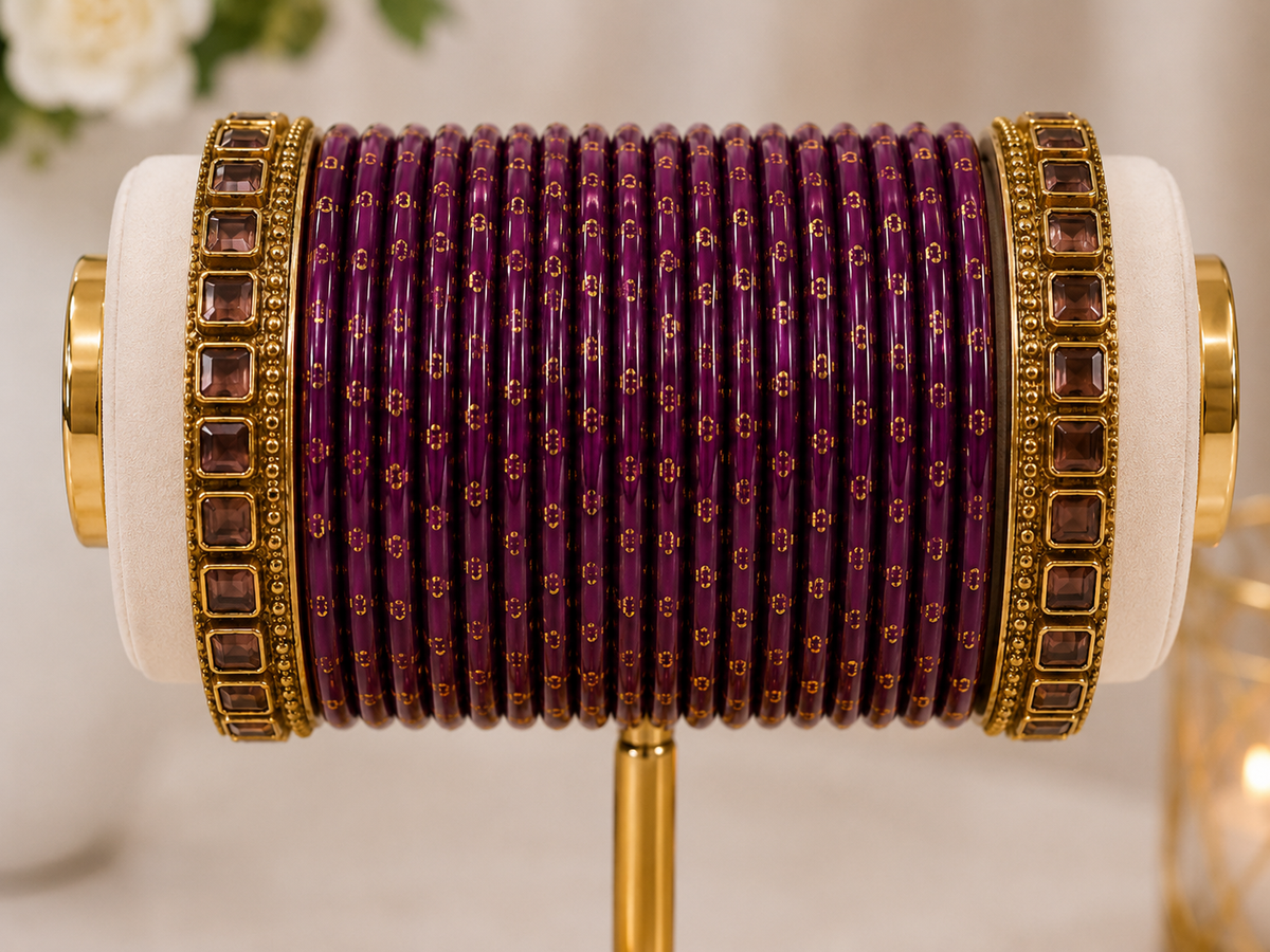 (B15) Elegant deep purple bangle set featuring delicate gold detailing and statement gold-toned stone bangles on each side. A beautiful traditional accessory size 2.4