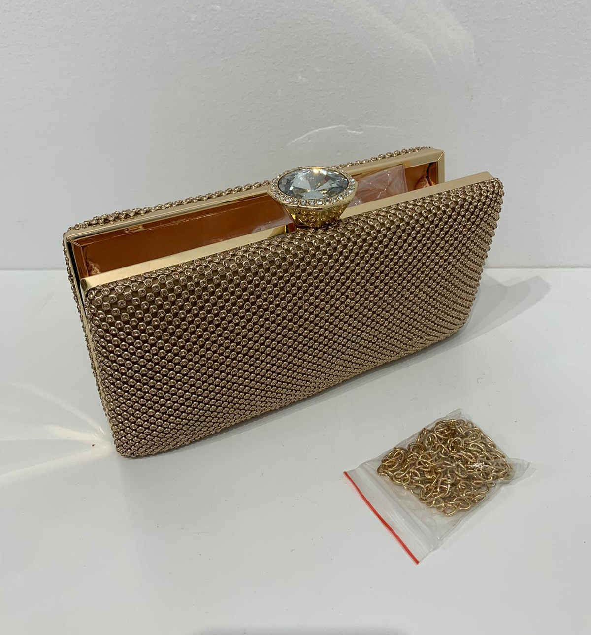 (220) Gold Clutch Bag with Clasp Opening & Long Chain
