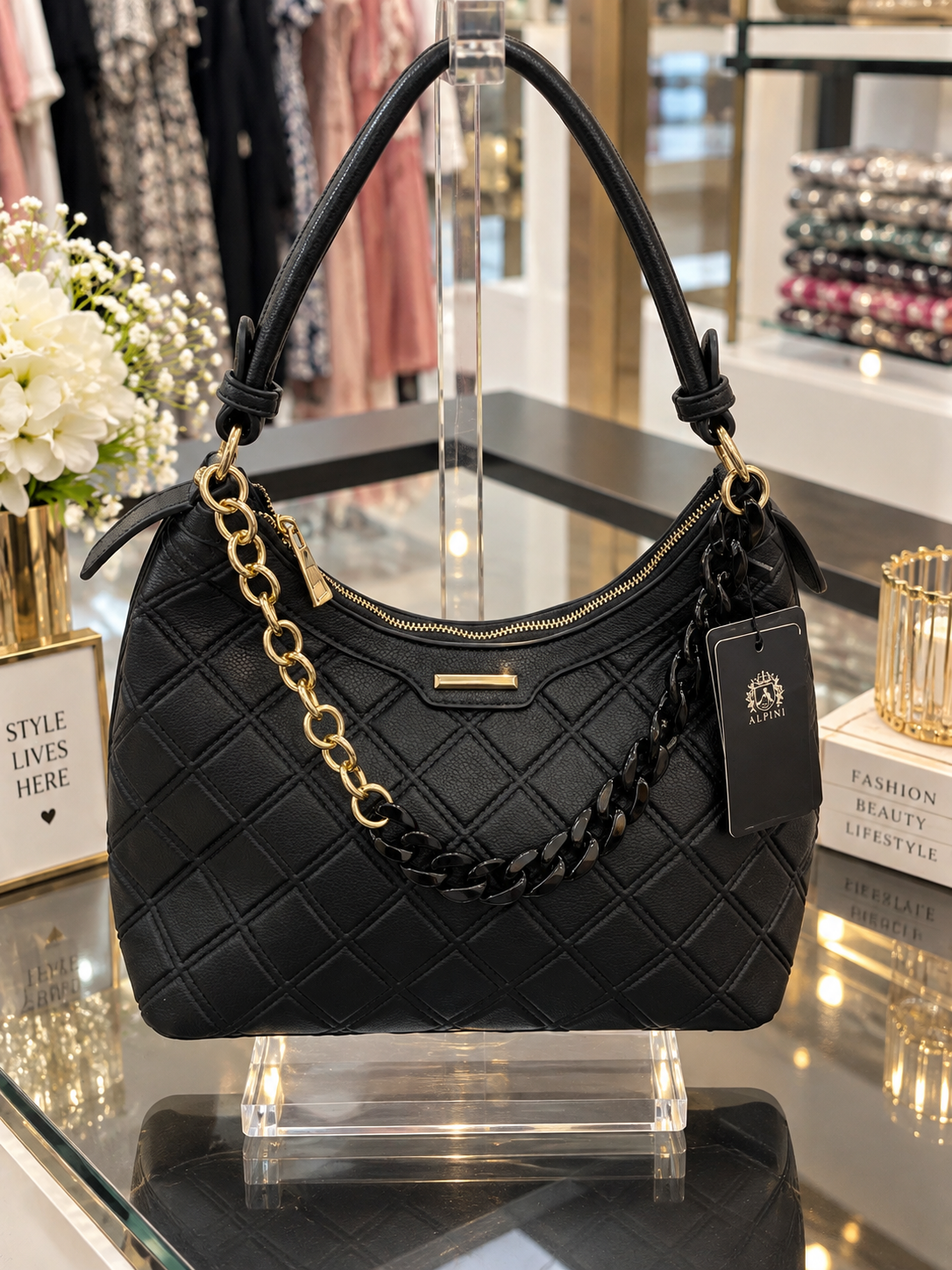 (357) Elegant black faux leather hobo shoulder bag with a stylish quilted design, chic gold hardware and statement chain detailing. Spacious, versatile and perfect for everyday wear or special occasions