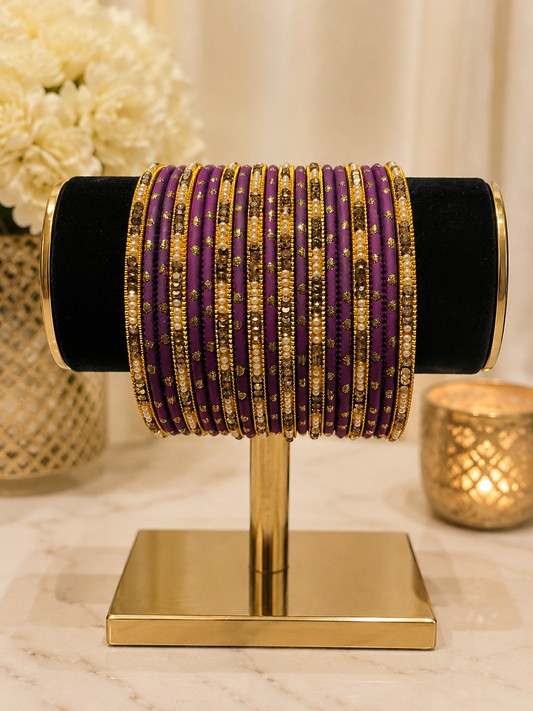 (B16) Elegant purple and gold bangle set featuring delicate gold detailing, sparkling stonework and pearl accents. A beautiful statement set, perfect for weddings, Eid, parties and special occasions size 2.4