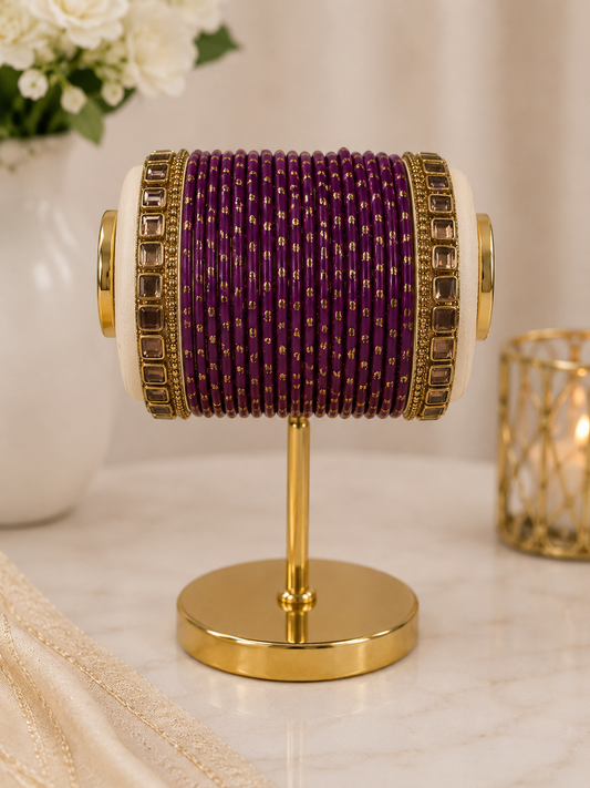 (B15) Elegant deep purple bangle set featuring delicate gold detailing and statement gold-toned stone bangles on each side. A beautiful traditional accessory size 2.4
