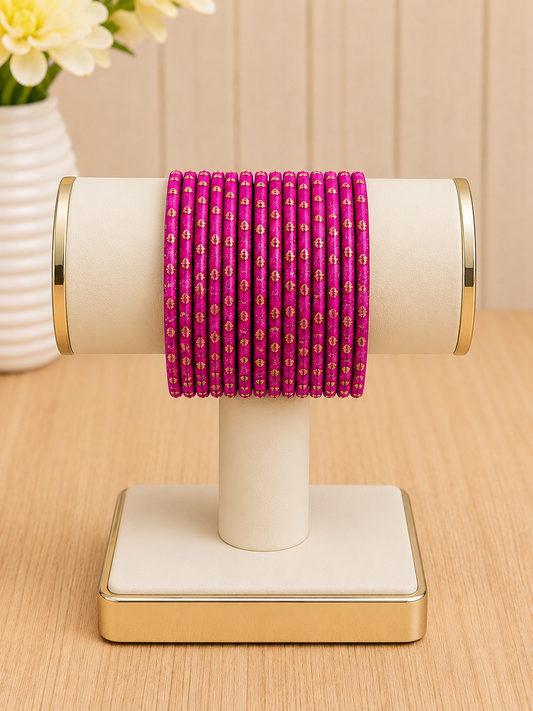 (B20) Elegant hot pink bangle set featuring delicate gold detailing throughout. Lightweight, vibrant and beautifully traditional — perfect for weddings, Eid, parties or adding a pop of colour to any outfit size 2.6