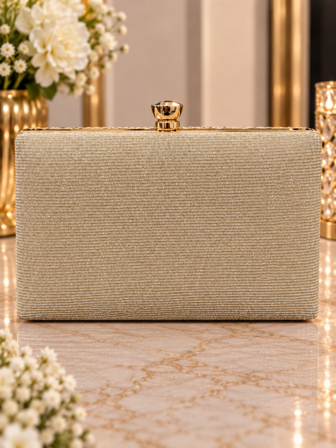 (33) Elegant champagne gold clutch bag featuring a stunning pleated shimmer design, sparkling finish and chic gold clasp