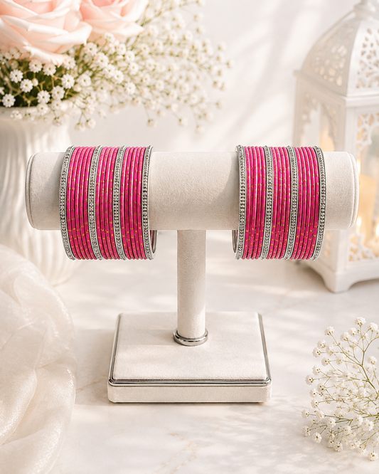 (B2) Elegant hot pink bangle set with sparkling silver detailing and delicate gold accents size 2.6