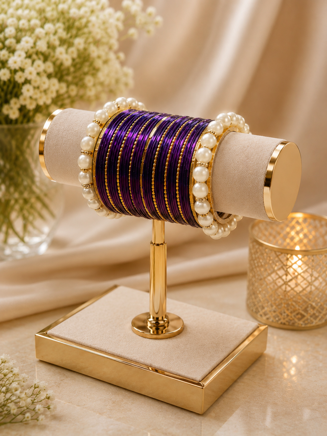 (B7) Elegant purple and gold bangle set featuring shimmering metallic bangles, delicate gold detailing and beautiful pearl accents. A timeless statement set size 2.4