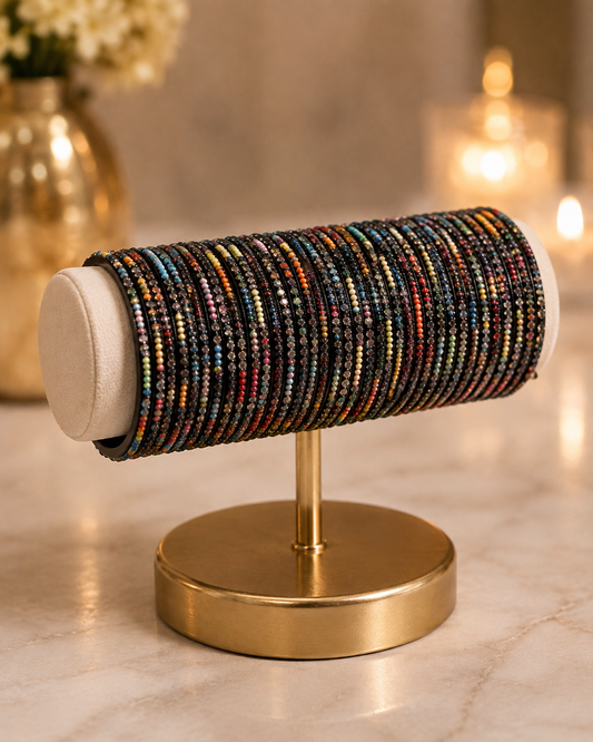 (B13) Elegant multicoloured bangle set featuring delicate beaded detailing and sparkling diamanté accents on a sleek black base perfect for adding colour and sparkle to everyday looks