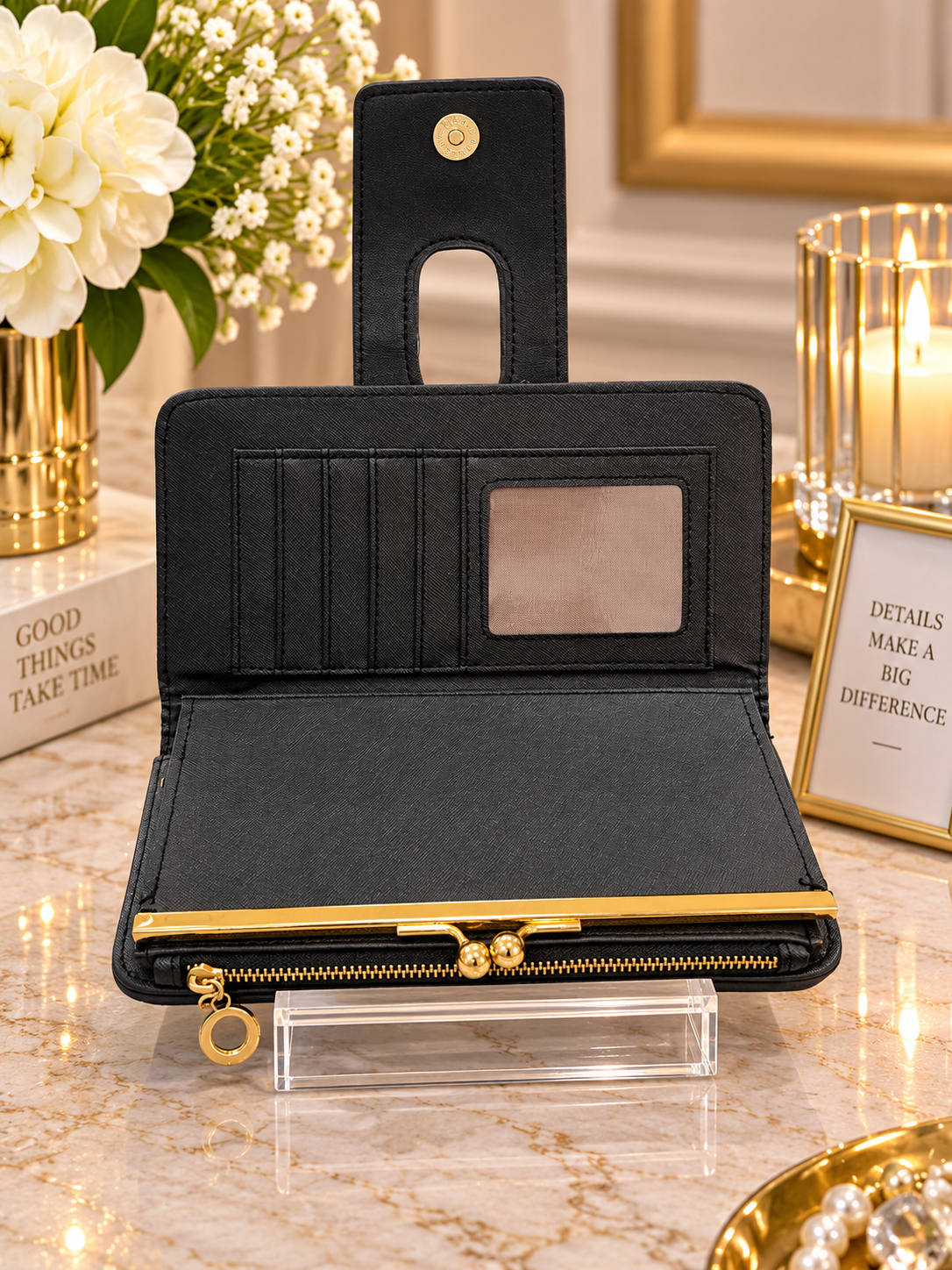 (356) Elegant faux leather black purse with chic gold detailing, multiple card slots, ID window and secure zip compartments. Stylish, spacious and perfect for everyday use